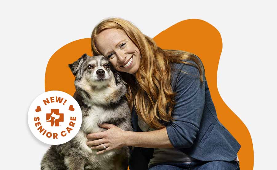20250423_033_900x554 A woman hugging her dog promoting new Banfield Senior Care Optimum Wellness Plans