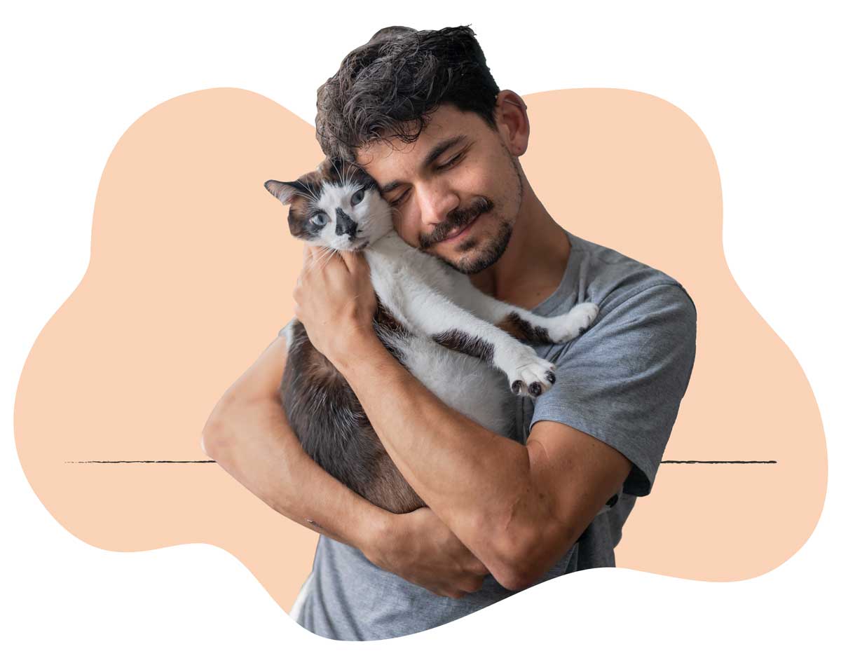 20250423_021 A man in a gray shirt holding his white and brown cat