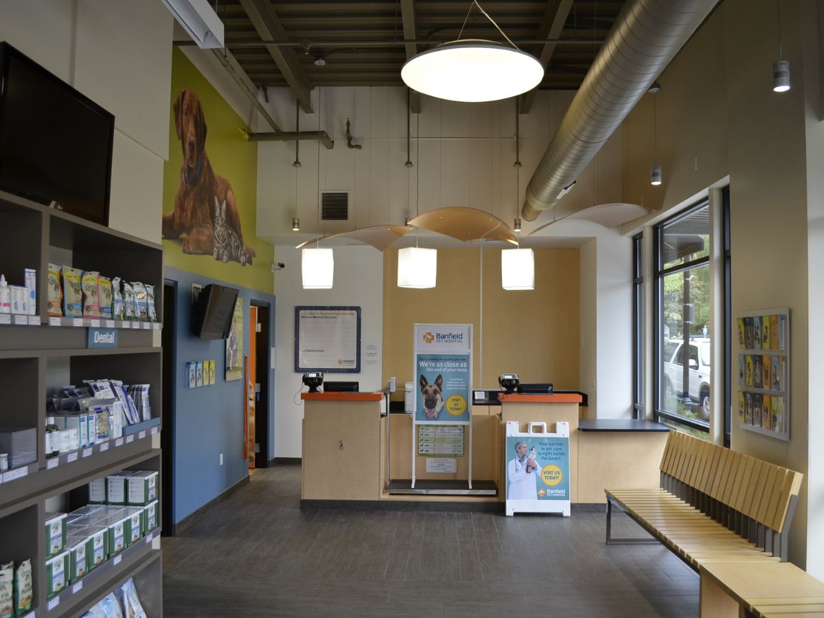 The front desk and supply shelves inside Banfield - West Linn