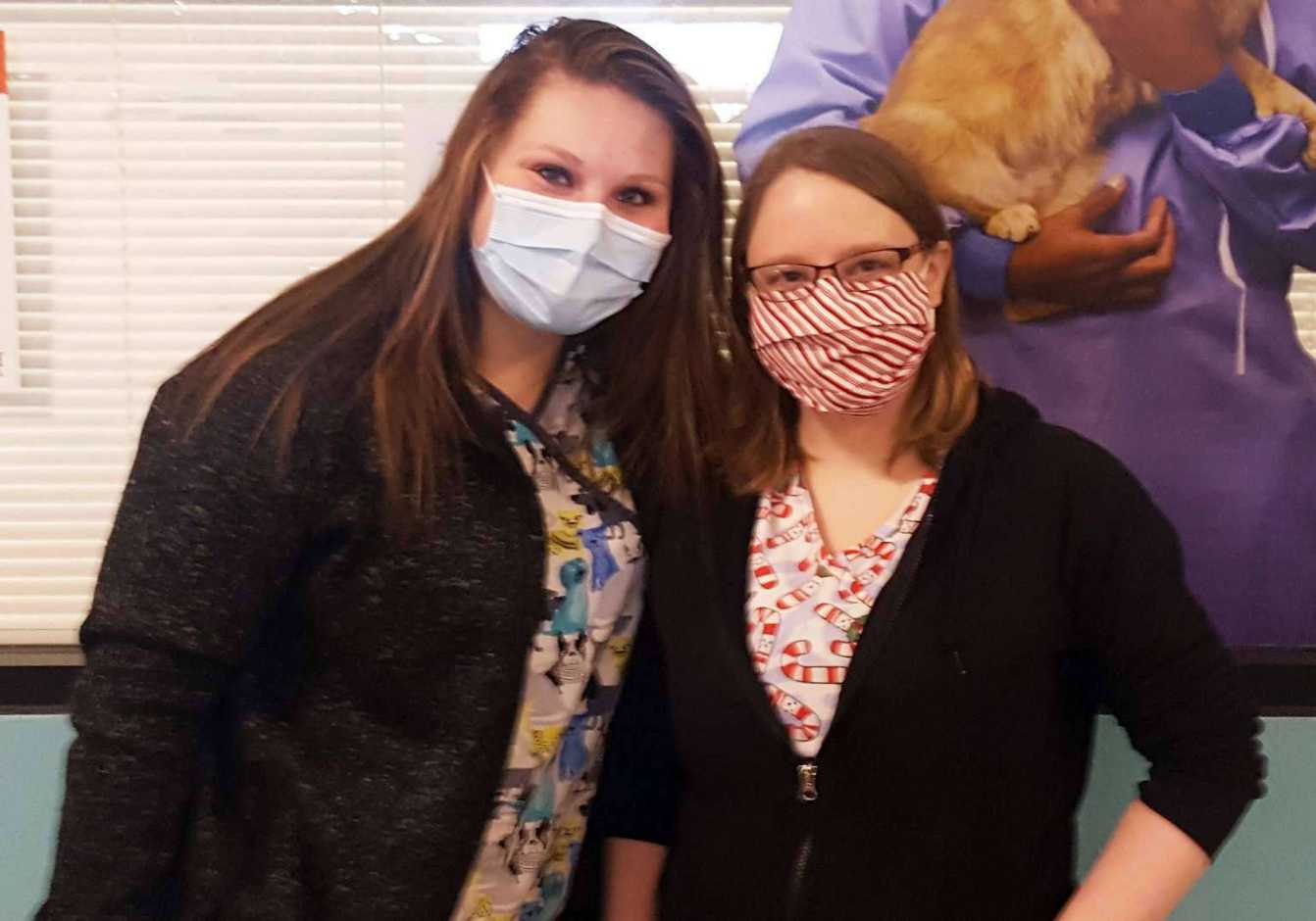 A couple female associates at the Banfield Pet Hospital