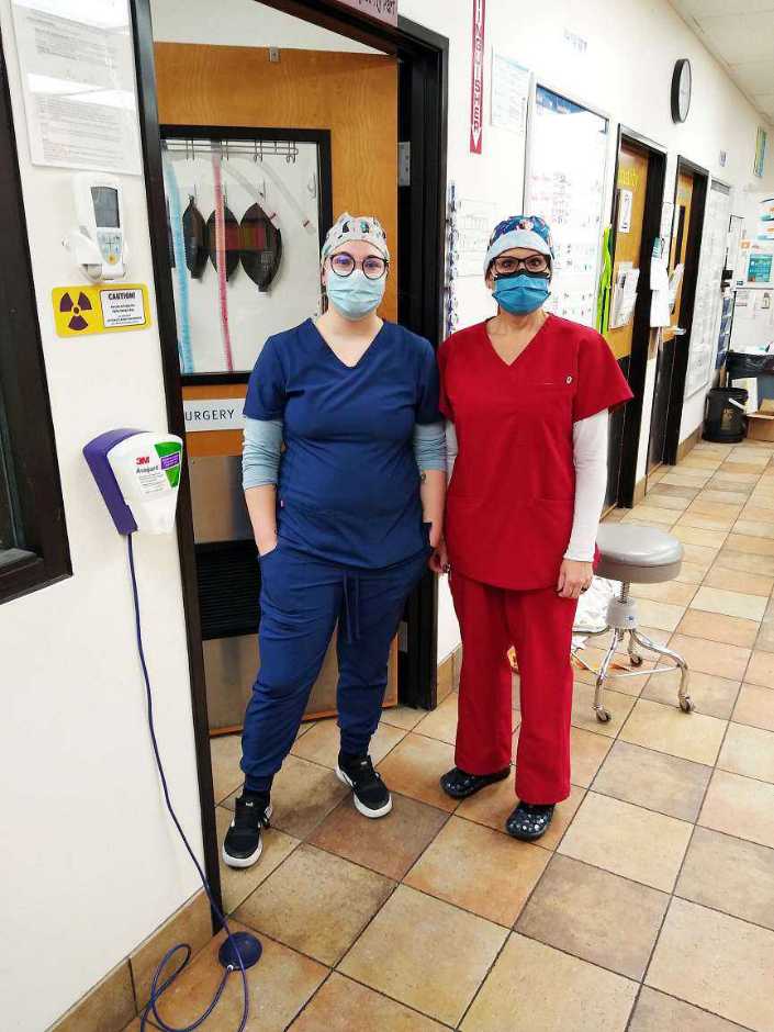 A couple of veterinarians at the Banfield Pet Hospital, West Jordan, UT